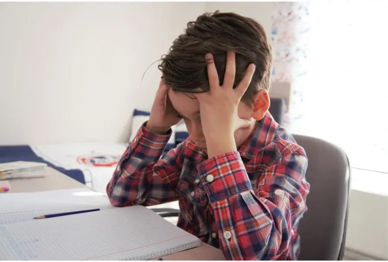 A clinician administering a learning disability diagnostic test to a child in a bright, engaging environment.