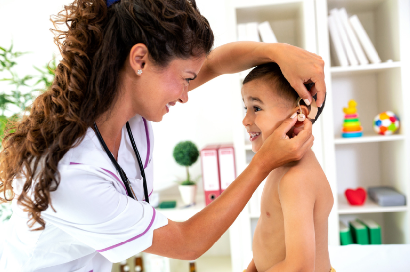 Hearing Aids and Speech Development