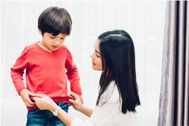 How to stop autistic child from taking off clothes in public?